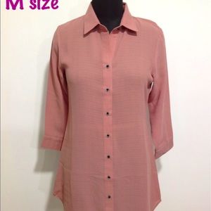 Tunic in asymmetric from bottom